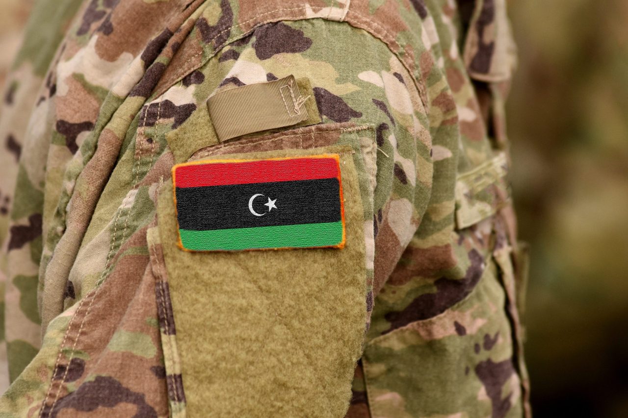 Libya,Flag,On,Soldiers,Arm.,Libyan,Army,(collage)