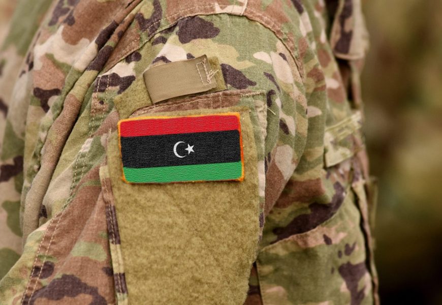 Libya,Flag,On,Soldiers,Arm.,Libyan,Army,(collage)