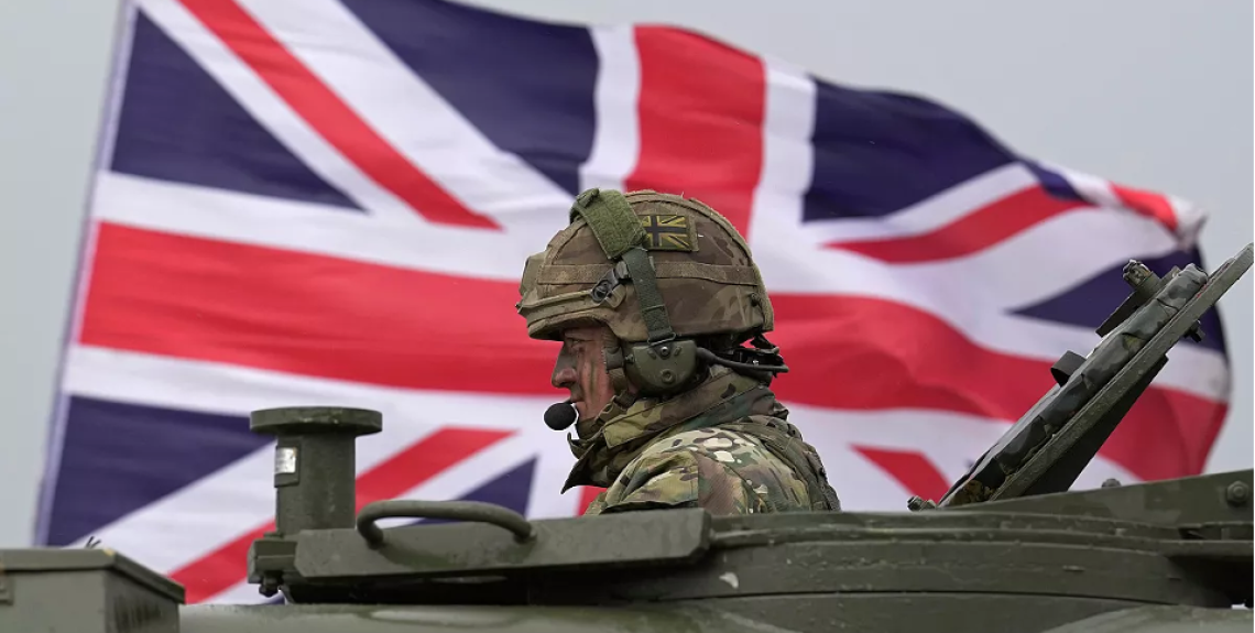 Source: Euronews. A British soldier in an AS90 armoured self-propelled howitzer.